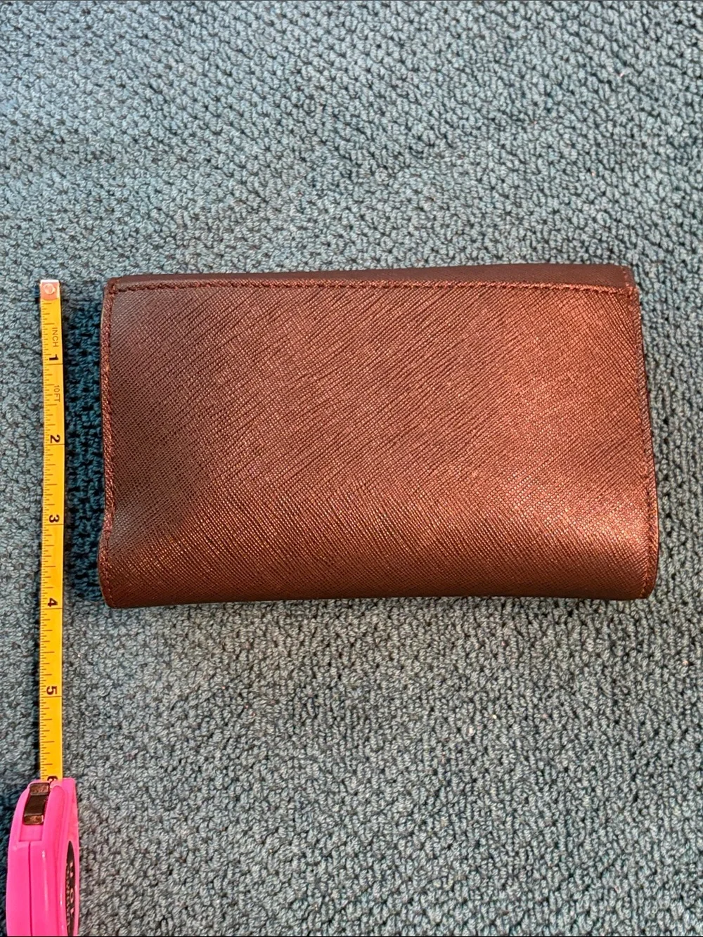Kate Spade black saffiano tri-fold hand wallet with gold logo